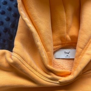 TNA hoodie